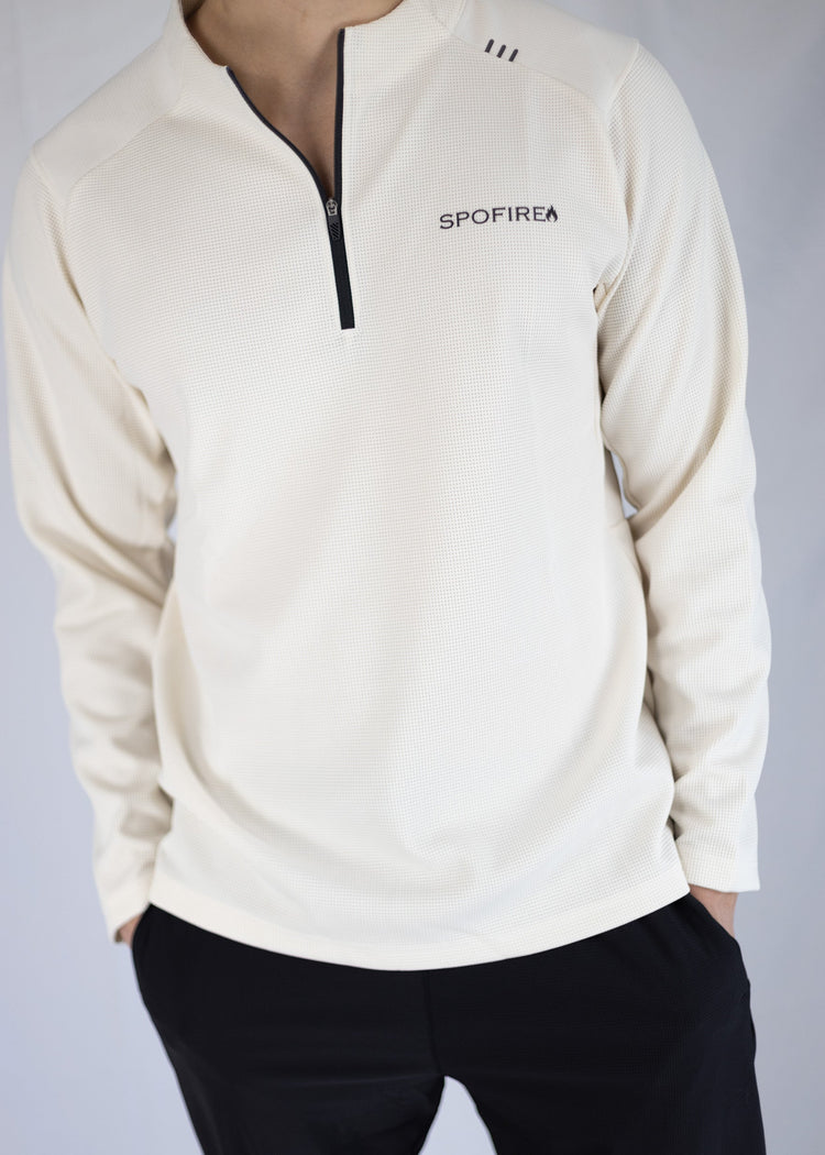 White long-sleeve shirt with a zipper and 'SPOFIRE' branding on a plain background